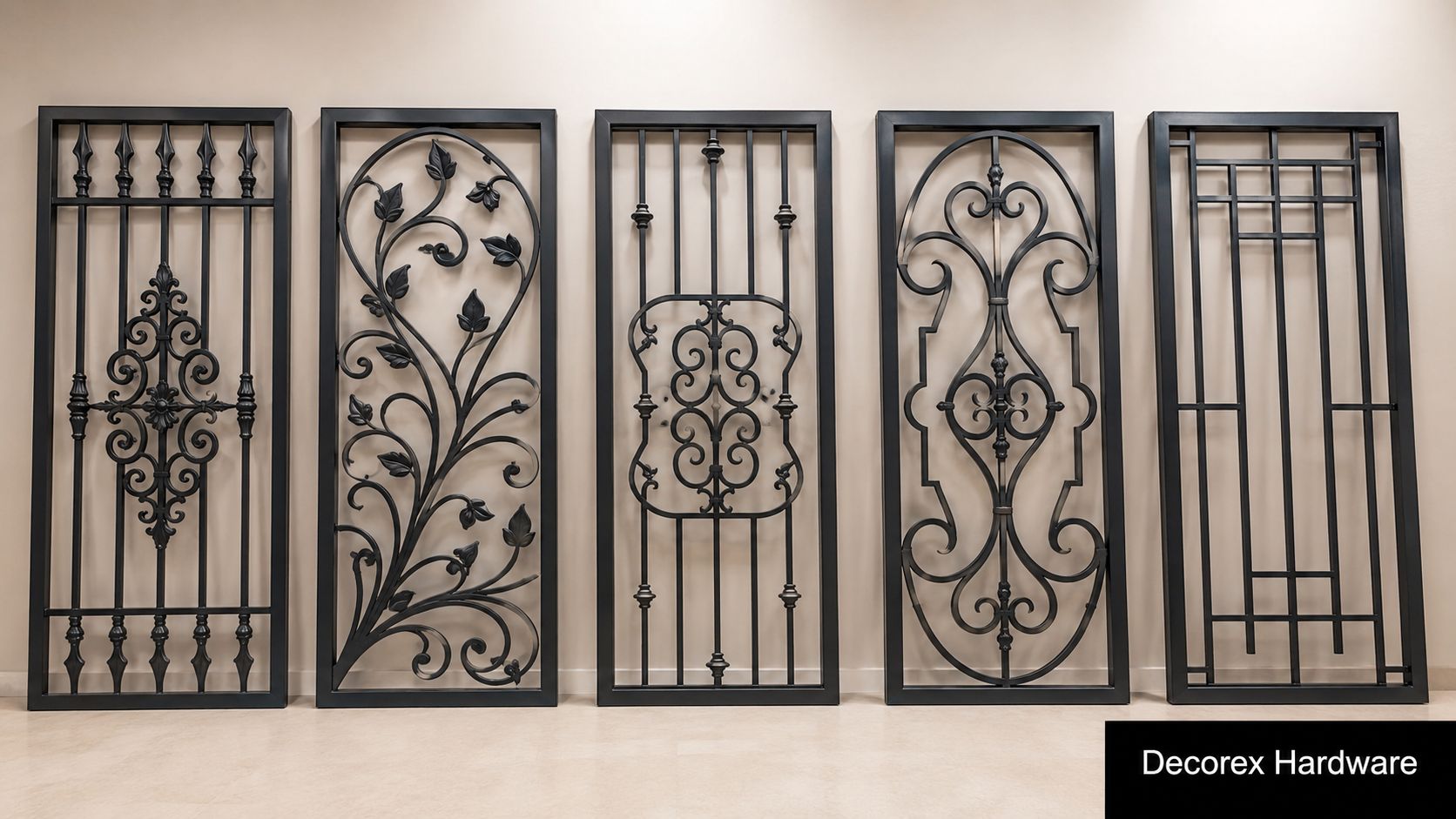 Five diverse decorative black metal security gate inserts displayed against a plain beige wall.